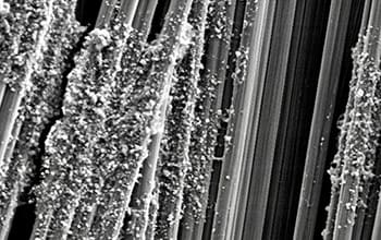 Nanocrystals from waste of recycled wood make carbon-fiber composites tougher