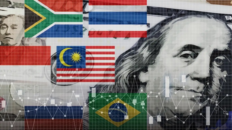 Who's in trouble, the US dollar or emerging economies?