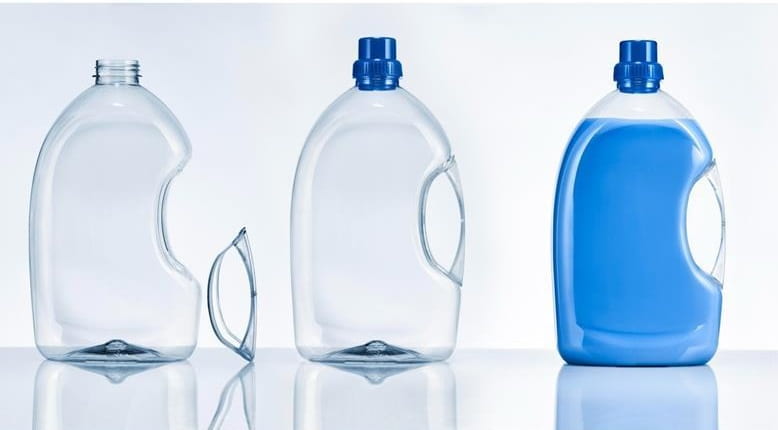 KHS offers glued-in handles for rPET bottles, intending to reduce emissions and increase efficiency