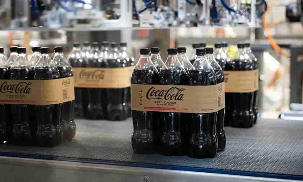 Coca-Cola is making a significant eco-friendly move by teaming up with DS Smith and Coca-Cola HBC Austria to replace plastic handles on 1.5 litre PET soft drink multi-packs with outer packaging made from cardboard